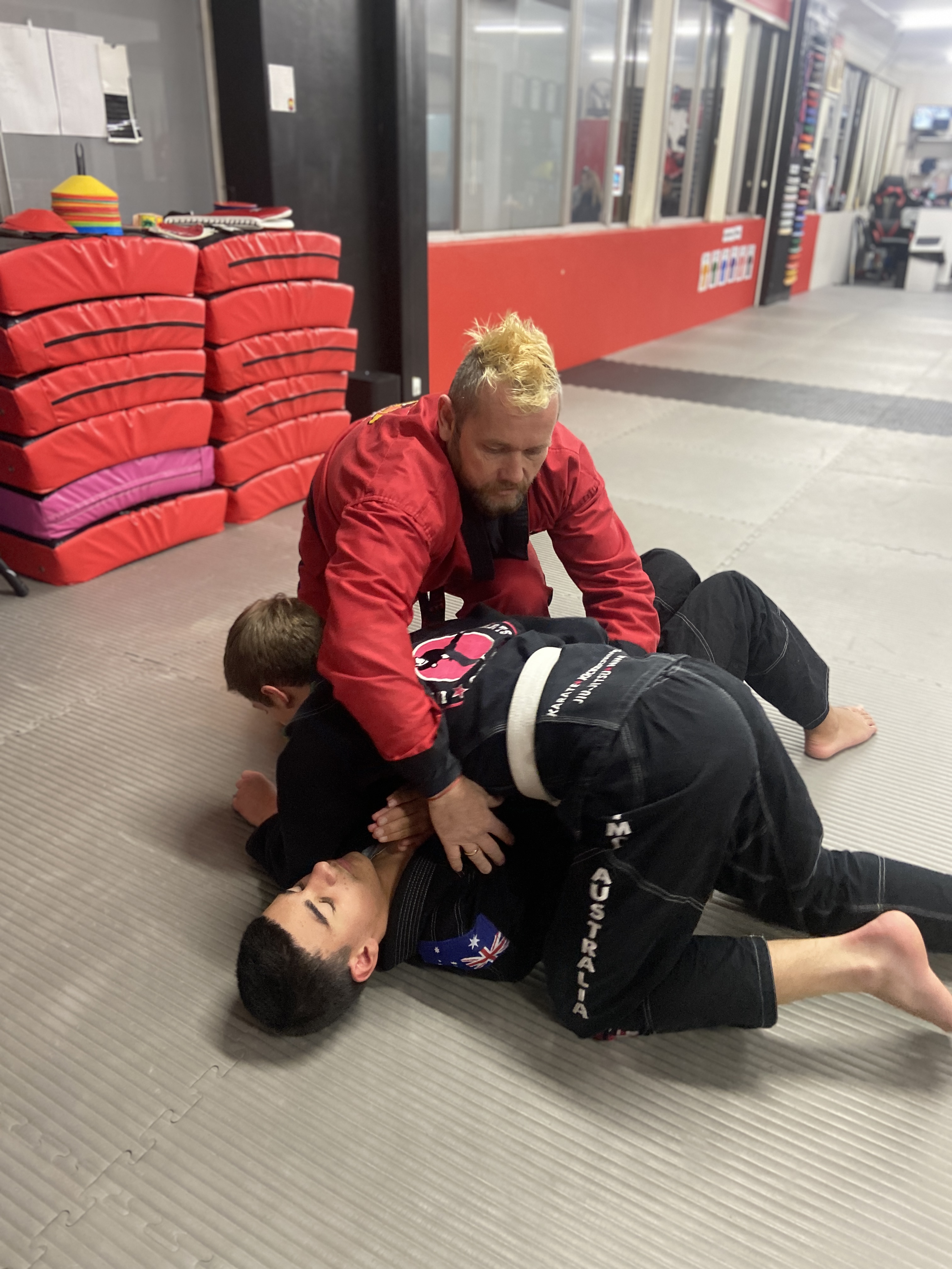 Adult student looking focused before BJJ class at IMC Engadine